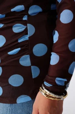 Doorschijnende top met polka dot