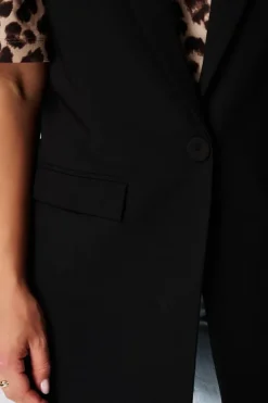 Lang gilet met knoopsluiting