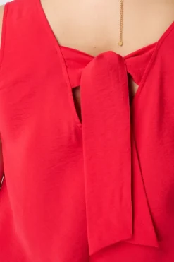 Mouwloze blouse met striksluiting