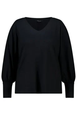Top met pofmouwen
