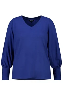 Top met pofmouwen