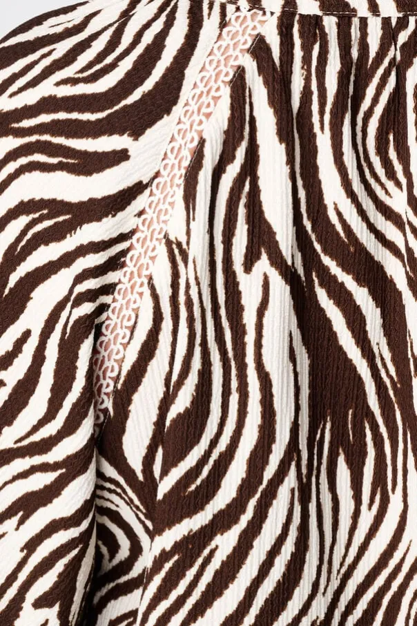 Top met print en v-hals